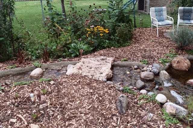 Stone bridge over stream